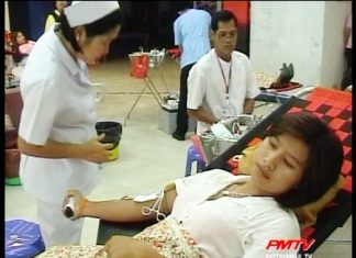 A Nurse takes blood from a kind hearted donor